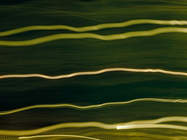 Flowing energy lines on dark obsidian background